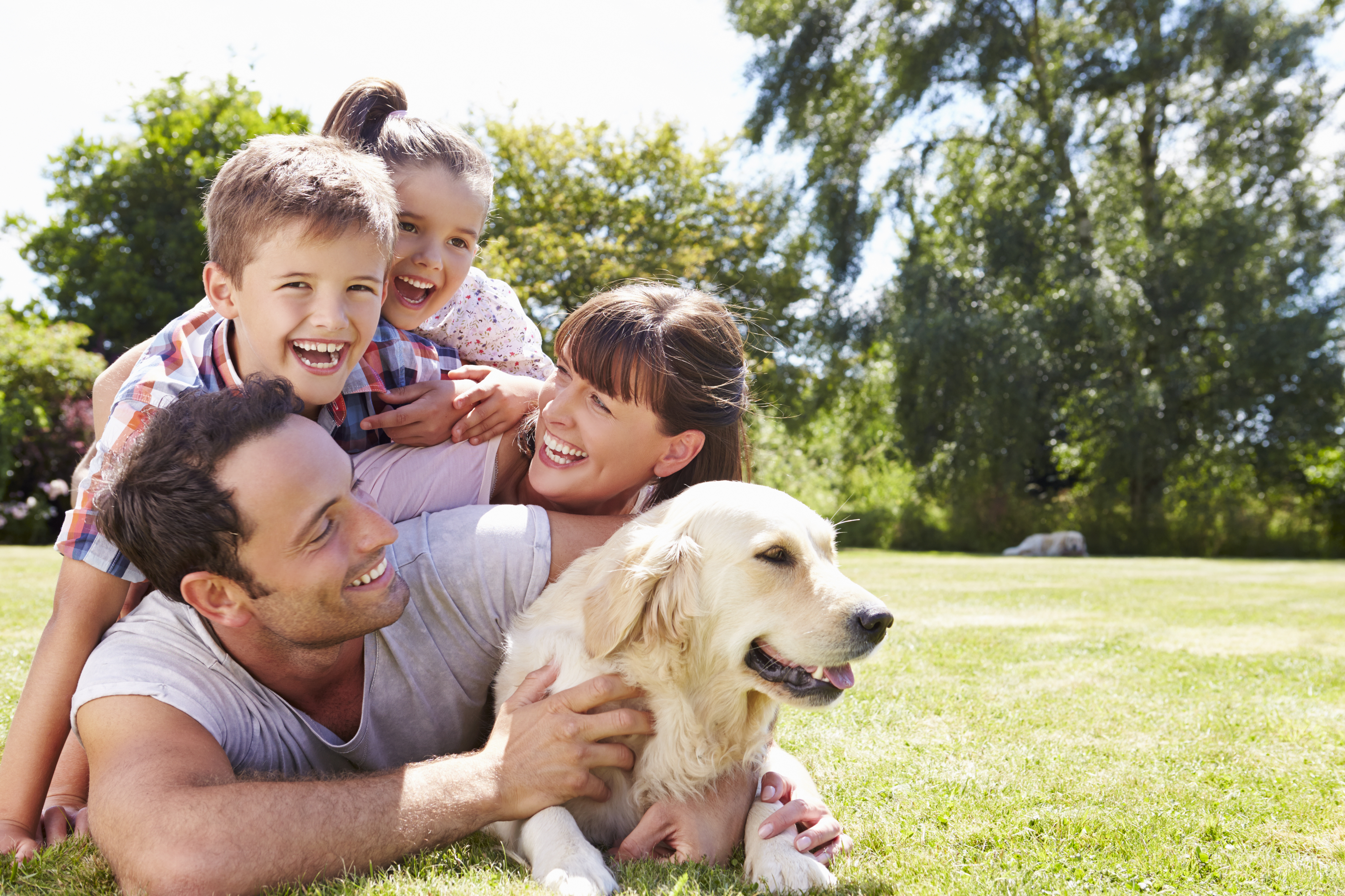 A happy Leading Paws family